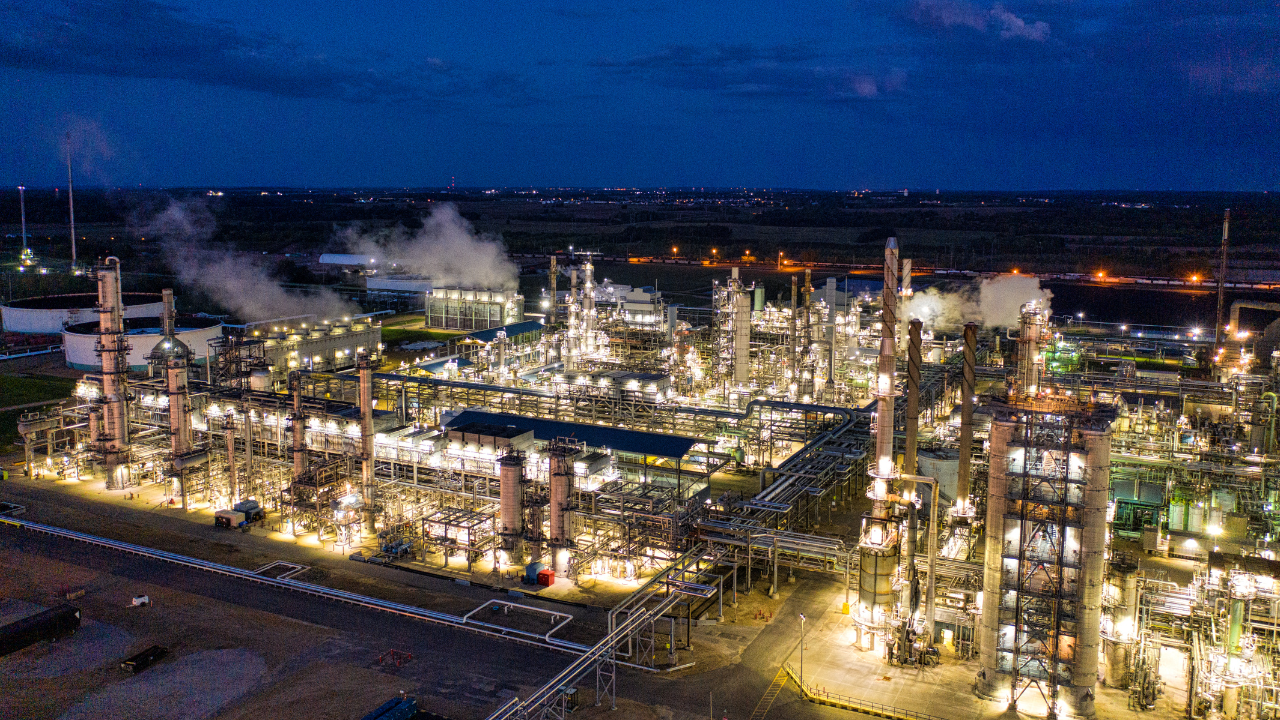 Industrial processing complex and process infrastructure at dusk